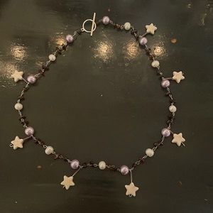 hand-made purple pearl and red garnet necklace.